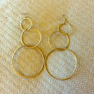 Long, very light, faux gold earrings